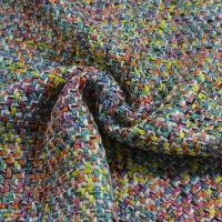 Haute couture grof geweven mantelpak stof  multi colors lurex