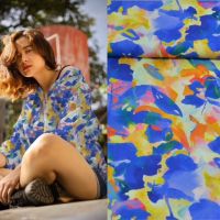 Viscose digitaal bloemen print lila geel kobalt 