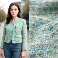 Grof geweven mantelpak stof / boucle  ivory met lurex zee groen