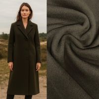  mantelstof 100%wol mos groen melange  exclusieve designer stof 