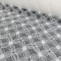 Fantasie tule brode met bloementjes artikel 3585-110  ivory uitlopend