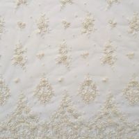 Couture kant met kraaltjes en gouddraad