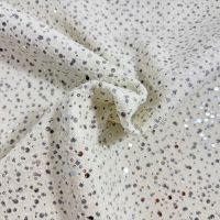 Jeans stof met pailletten gaatjes motief ivory