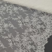 coupon 60x1.50 Franse bruidskant ivory kleur 111